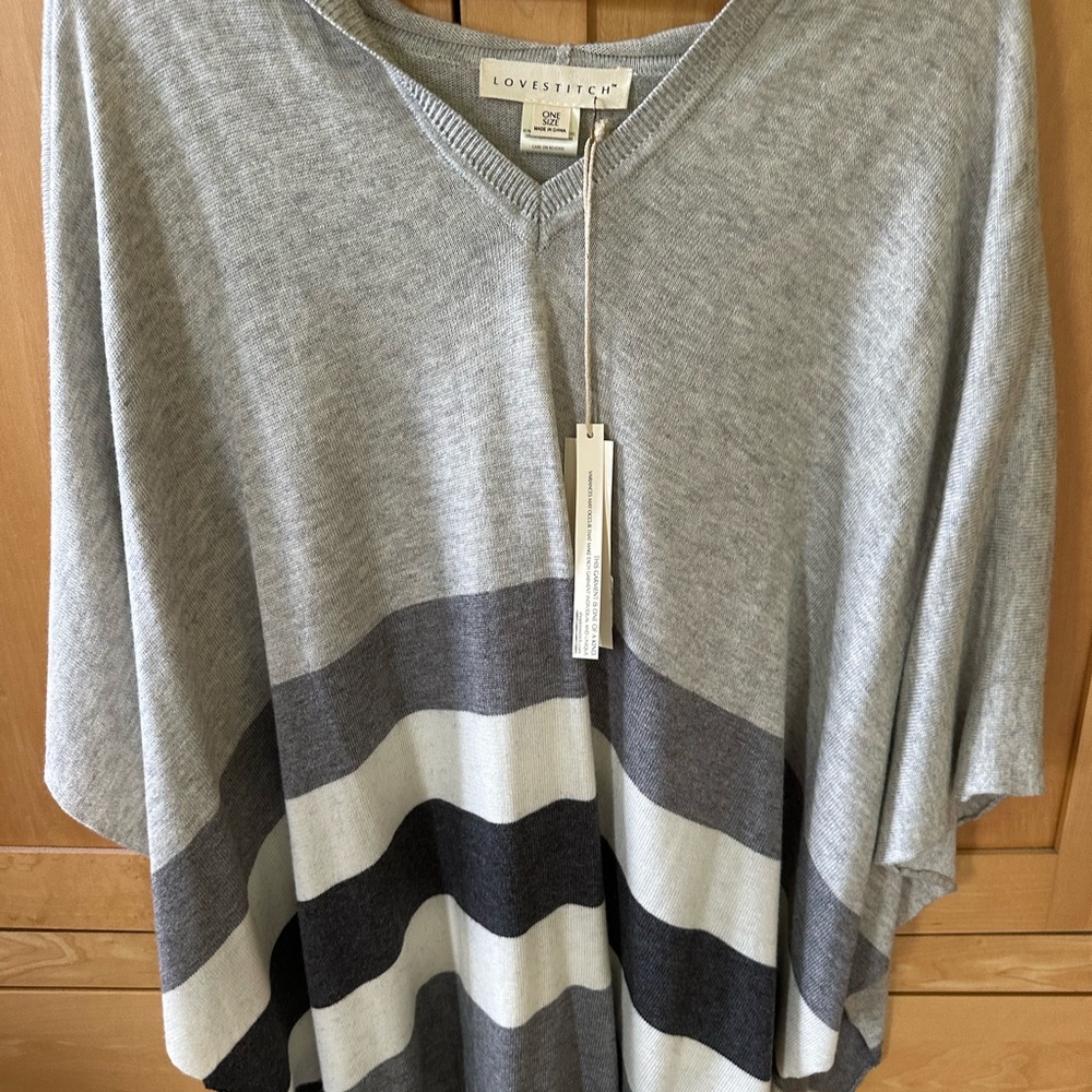 Lovestitch new with tags hooded pancho.